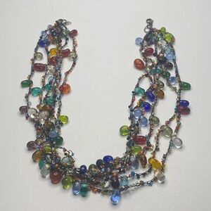 Glass and bead happy necklace.